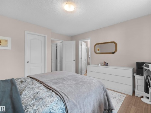 #90 5001 62 St, Beaumont, AB - Indoor Photo Showing Bedroom