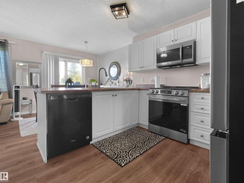 #90 5001 62 St, Beaumont, AB - Indoor Photo Showing Kitchen