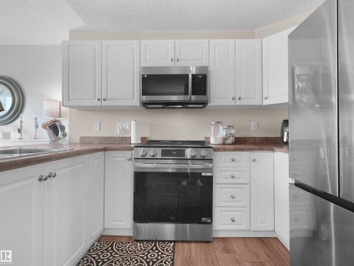 #90 5001 62 St, Beaumont, AB - Indoor Photo Showing Kitchen