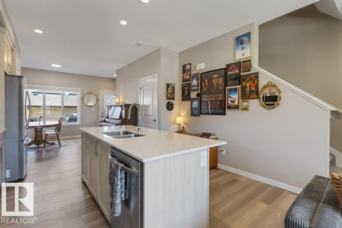 7056 181 Avenue Nw, Edmonton, AB - Indoor Photo Showing Kitchen With Double Sink