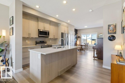 7056 181 Avenue Nw, Edmonton, AB - Indoor Photo Showing Kitchen With Double Sink With Upgraded Kitchen