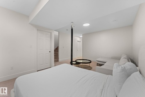 Recessed lighting, white walls, and light-toned carpet - 5415 167A Avenue Nw, Edmonton, AB - Indoor Photo Showing Bedroom