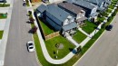 Gable roofline, covered front porch, concrete sidewalks, fenced backyard, and manicured lawns - 17359 49 Street Nw, Edmonton, AB  - Outdoor With View 
