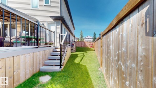 Expansive deck featuring black metal railings and direct access to the yard - 17359 49 Street Nw, Edmonton, AB -  Photo Showing Other Room
