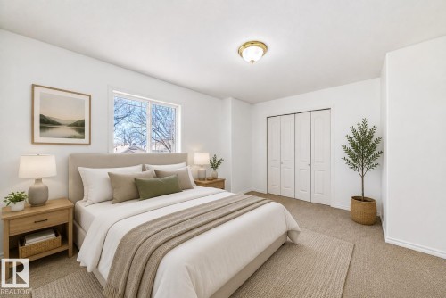 Virtually staged room with illustrating potential of room with furniture, decor and new flooring show a white walls, window, carpeted flooring, and bi-fold closet doors - 11727 83 Street Nw, Edmonton, AB - Indoor Photo Showing Bedroom