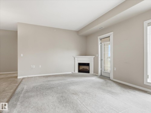 #417 612 111 St Sw, Edmonton, AB - Indoor With Fireplace