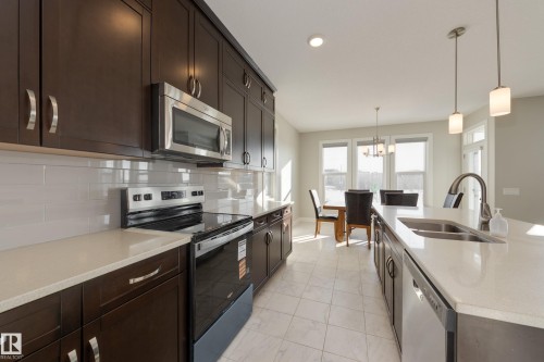 7473 Colonel Mewburn Road Nw, Edmonton, AB - Indoor Photo Showing Kitchen With Double Sink With Upgraded Kitchen