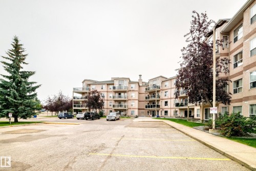 Multi-story building with multiple balconies and a beige exterior finish - #137 9704 174 St Nw, Edmonton, AB - Outdoor With Facade