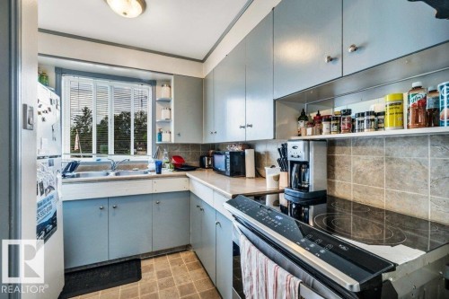 9928 79 Street Nw, Edmonton, AB - Indoor Photo Showing Kitchen With Double Sink