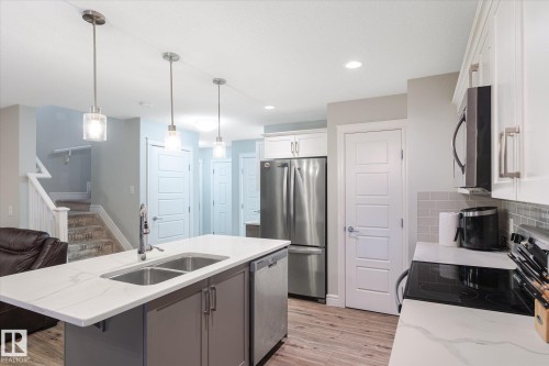 1416 169 Street Sw, Edmonton, AB - Indoor Photo Showing Kitchen With Stainless Steel Kitchen With Double Sink With Upgraded Kitchen