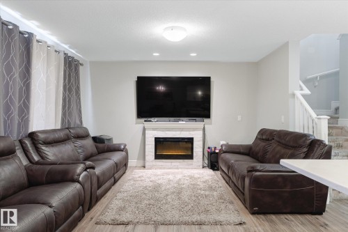 1416 169 Street Sw, Edmonton, AB - Indoor Photo Showing Living Room With Fireplace