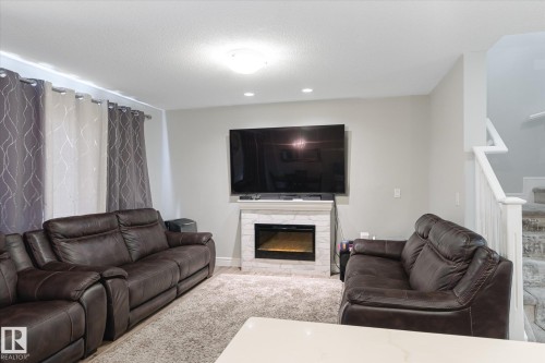 1416 169 Street Sw, Edmonton, AB - Indoor Photo Showing Living Room With Fireplace