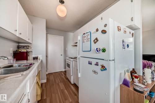 #206 7220 144 Av Nw, Edmonton, AB - Indoor Photo Showing Kitchen With Double Sink