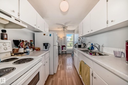 #206 7220 144 Av Nw, Edmonton, AB - Indoor Photo Showing Kitchen With Double Sink