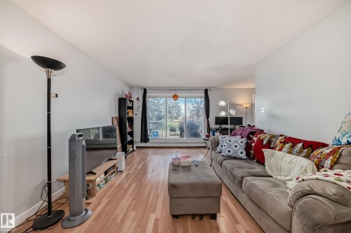 #206 7220 144 Av Nw, Edmonton, AB - Indoor Photo Showing Living Room