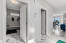 White and grey interior walls, white trim, and white doors - 1103 26 Avenue Nw, Edmonton, AB  - Indoor Photo Showing Other Room 