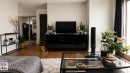 Hardwood-finish flooring, white wall finishes, dark trim, and a built-in media console - #301 13907 136 St Nw, Edmonton, AB  - Indoor Photo Showing Other Room 