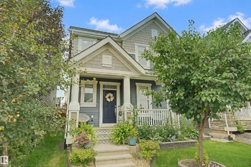 Craftsman-style exterior with gabled roof lines and shake siding accents - 7603 Summerside Grande Boulevard Sw, Edmonton, AB - Outdoor With Deck Patio Veranda