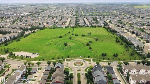 Expansive green space bordered by residential properties - 7603 Summerside Grande Boulevard Sw, Edmonton, AB - Outdoor With View