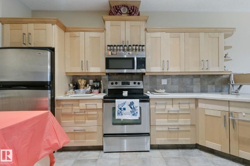 10416 69 Avenue Nw, Edmonton, AB - Indoor Photo Showing Kitchen With Stainless Steel Kitchen