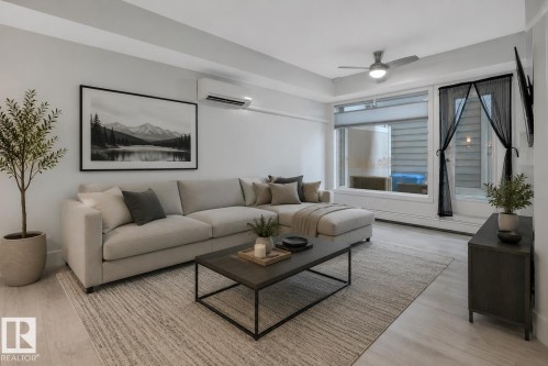 #105 10030 83 Av Nw, Edmonton, AB - Indoor Photo Showing Living Room