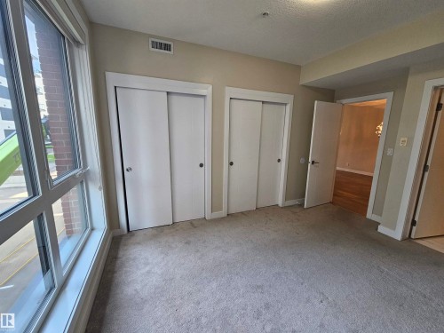 #207 11710 87 Av Nw, Edmonton, AB - Indoor Photo Showing Other Room