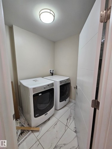 #207 11710 87 Av Nw, Edmonton, AB - Indoor Photo Showing Laundry Room