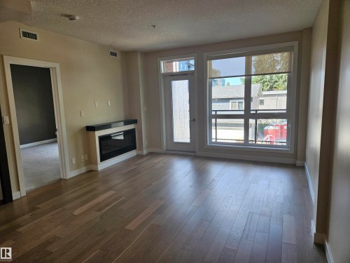 #207 11710 87 Av Nw, Edmonton, AB - Indoor With Fireplace