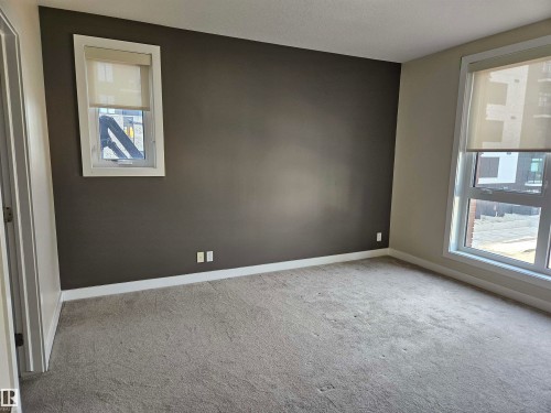 #207 11710 87 Av Nw, Edmonton, AB - Indoor Photo Showing Other Room