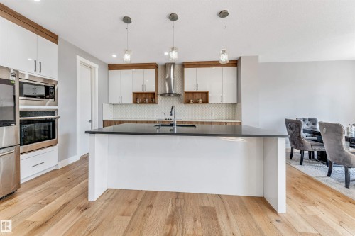 704 172 St Sw, Edmonton, AB - Indoor Photo Showing Kitchen With Upgraded Kitchen