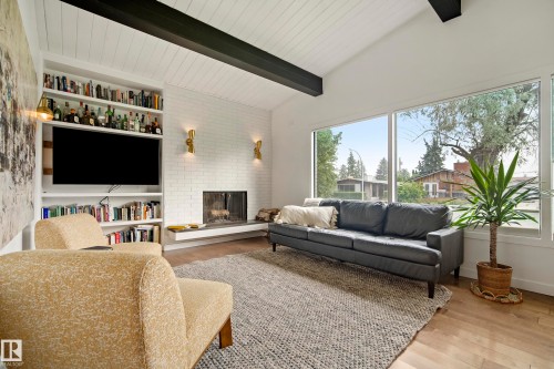 7008 91 Avenue Nw, Edmonton, AB - Indoor Photo Showing Living Room With Fireplace