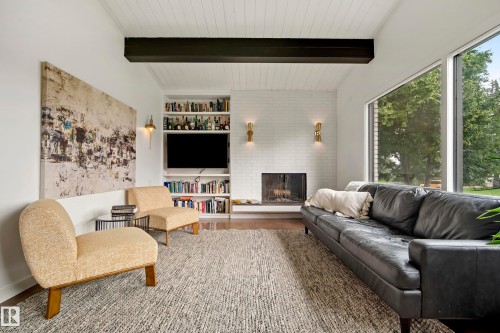 7008 91 Avenue Nw, Edmonton, AB - Indoor Photo Showing Living Room With Fireplace