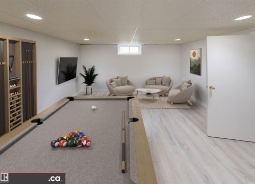 Recessed lighting, light wood-finish flooring, built-in storage shelving, and a small transom window - 9531 74 Street Nw, Edmonton, AB - Indoor Photo Showing Basement
