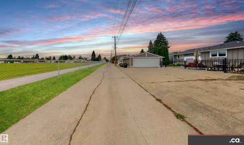 Detached garage with a roll-up door - 9531 74 Street Nw, Edmonton, AB - Outdoor With View