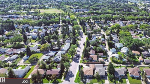 Residential area featuring mature trees and established homes - 9531 74 Street Nw, Edmonton, AB - Outdoor With View