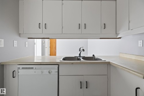 #304 24 Alpine Pl, St. Albert, AB - Indoor Photo Showing Kitchen With Double Sink
