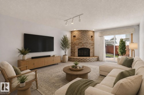 5814 181 Street Nw, Edmonton, AB - Indoor Photo Showing Living Room With Fireplace