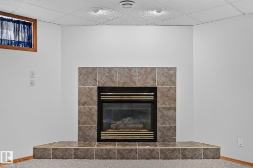 5814 181 Street Nw, Edmonton, AB - Indoor Photo Showing Living Room With Fireplace
