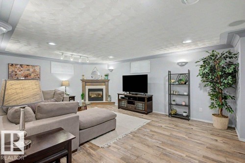 12112 38 Street Nw, Edmonton, AB - Indoor Photo Showing Living Room With Fireplace