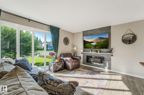 14115 70 Street Nw, Edmonton, AB - Indoor Photo Showing Living Room With Fireplace