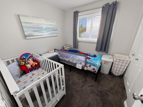 12 Mathias Avenue, Spruce Grove, AB - Indoor Photo Showing Bedroom