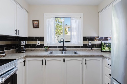 10946 Beaumaris Road Nw, Edmonton, AB - Indoor Photo Showing Kitchen With Double Sink