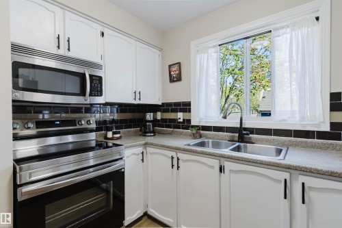 10946 Beaumaris Road Nw, Edmonton, AB - Indoor Photo Showing Kitchen With Double Sink