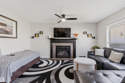 3760 12 Street Nw, Edmonton, AB - Indoor Photo Showing Living Room With Fireplace
