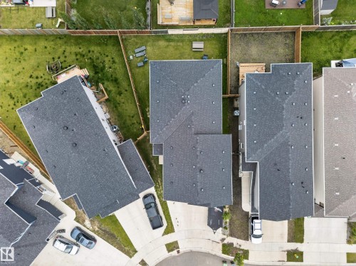 New construction properties featuring shingle roofing, private backyards, and paved driveways - 3217 Pelerin Crescent, Beaumont, AB -  With View