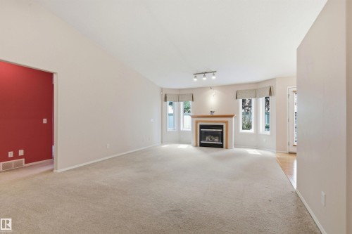 #10 9 Dechene Rd Nw, Edmonton, AB - Indoor With Fireplace