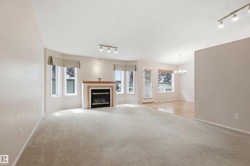 #10 9 Dechene Rd Nw, Edmonton, AB - Indoor With Fireplace