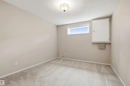 #10 9 Dechene Rd Nw, Edmonton, AB - Indoor Photo Showing Other Room