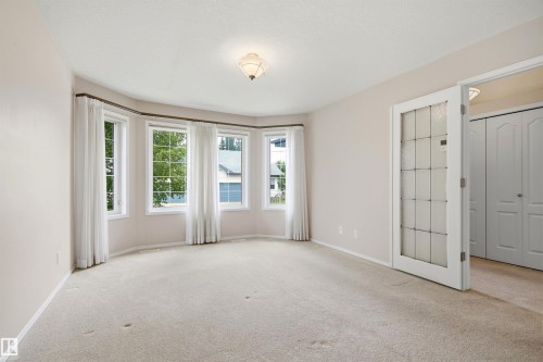 #10 9 Dechene Rd Nw, Edmonton, AB - Indoor Photo Showing Other Room