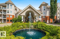 #220 9008 99 AV NW  Edmonton, AB T5H 4M6